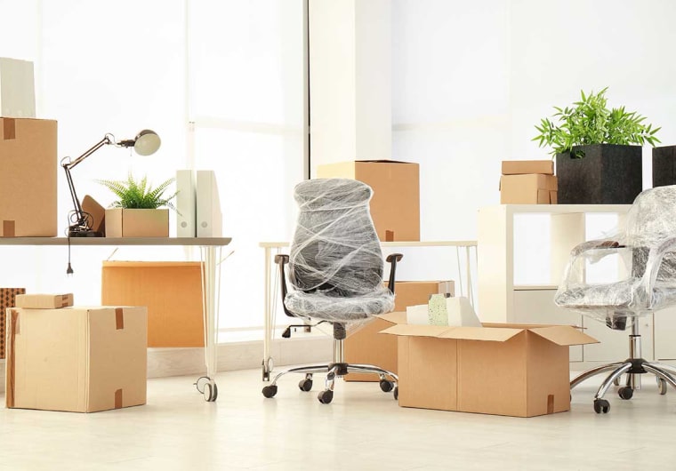 Photo of an office being packed up getting ready for moving