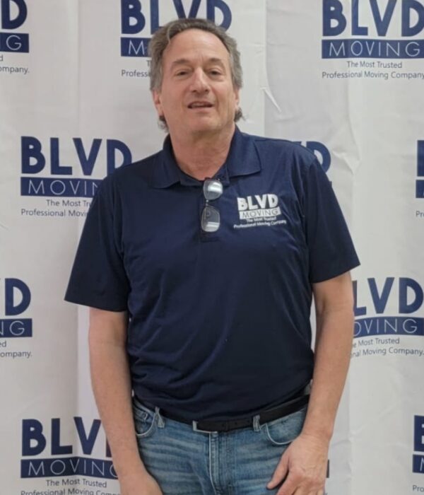 A photo of Matthew Freedman, the VP of Sales for BLVD Moving LLC